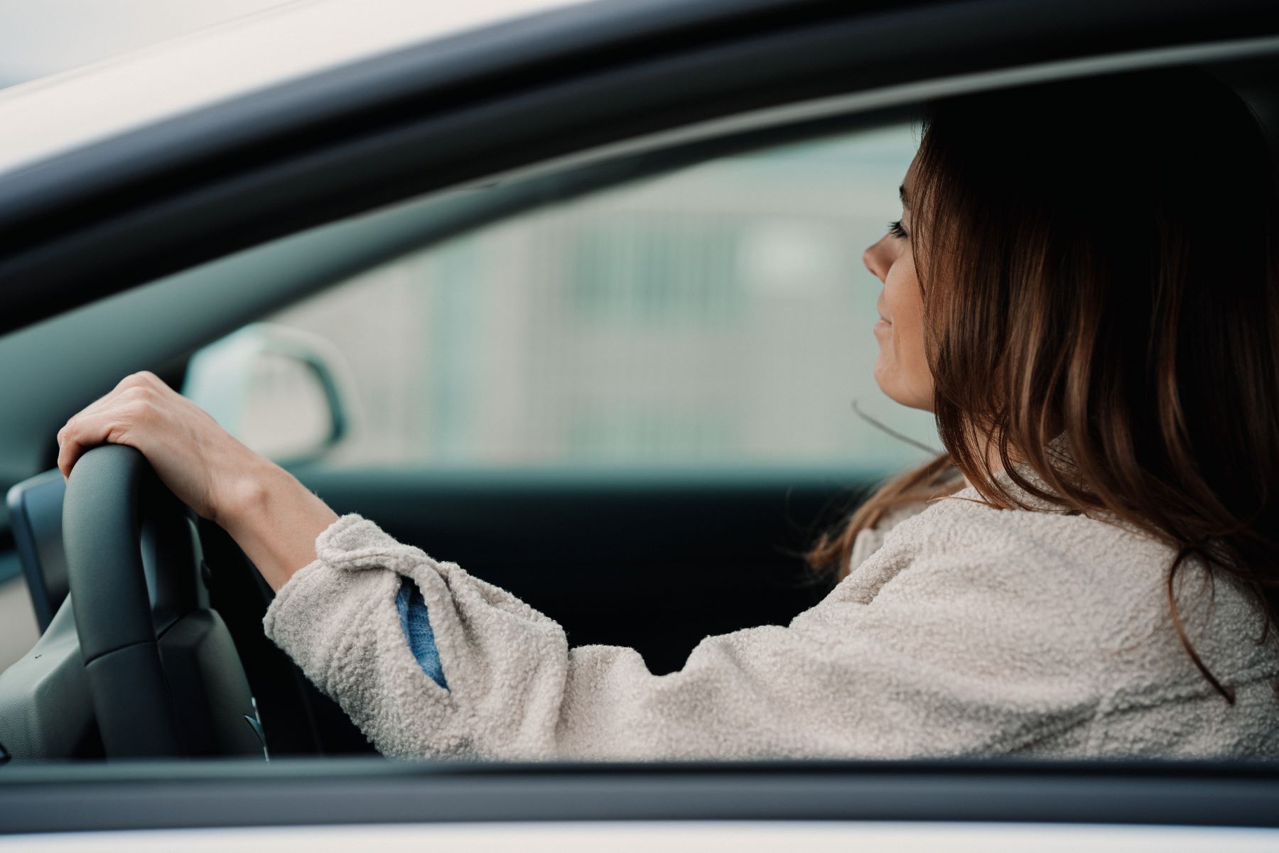 a woman driving a car