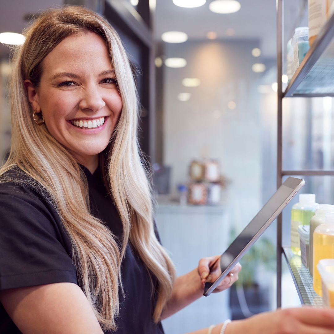 Female business owner smiling
